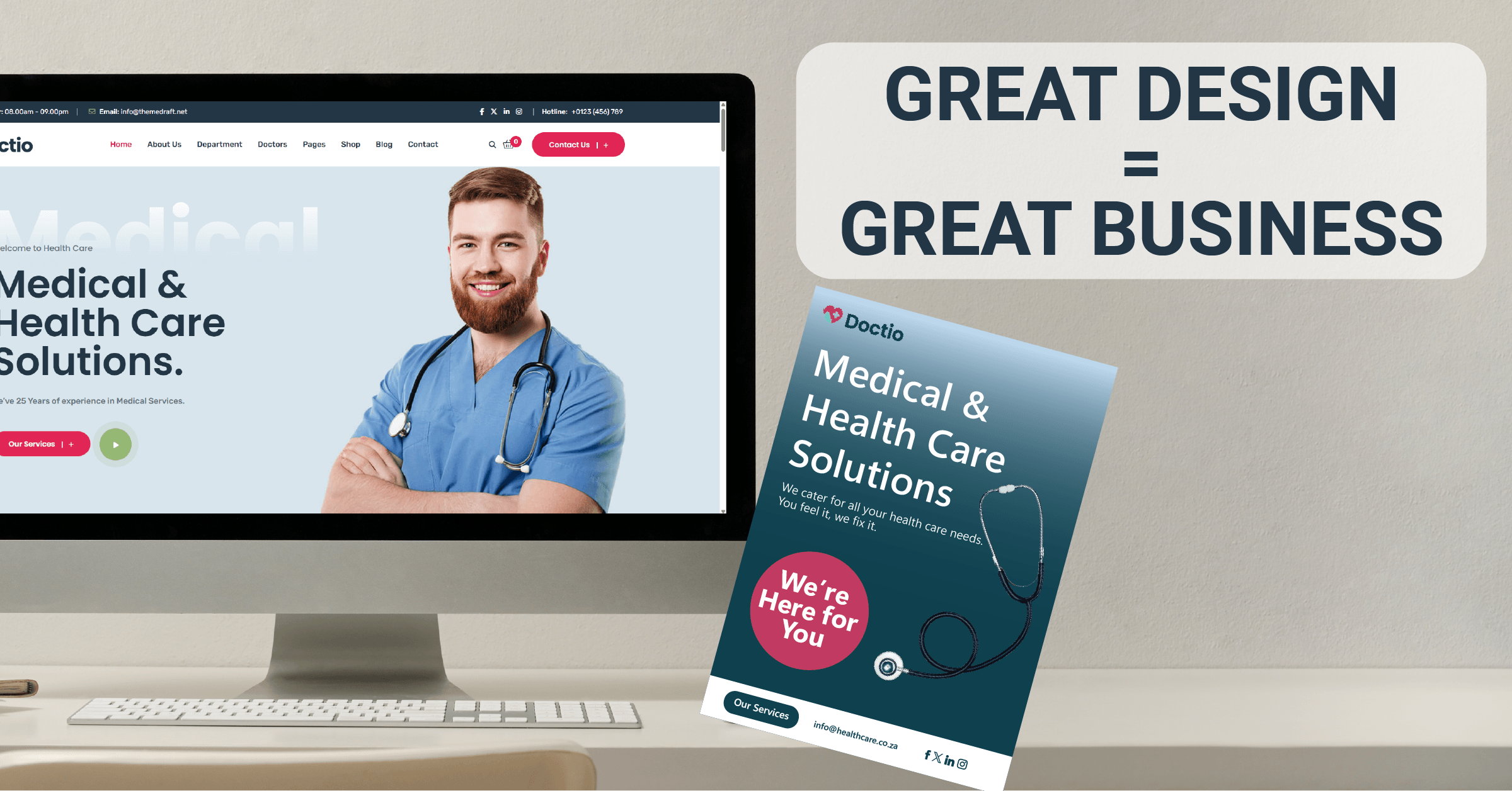 Flat lay of a computer and brochure showing clean, modern graphic and website design for business.
